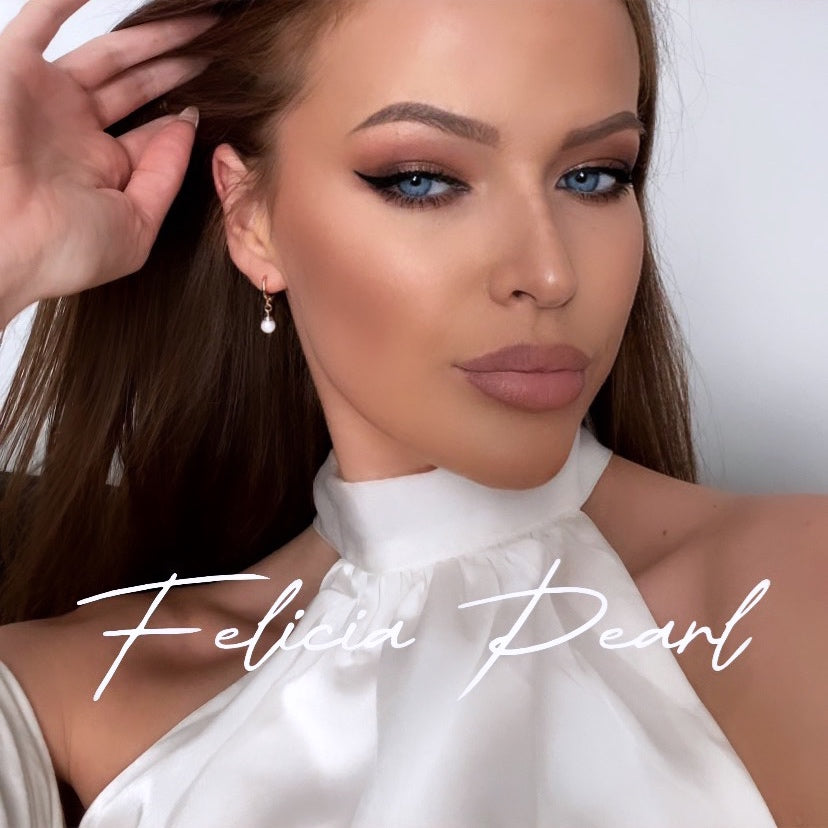 FELICIA PEARL AUSKARI